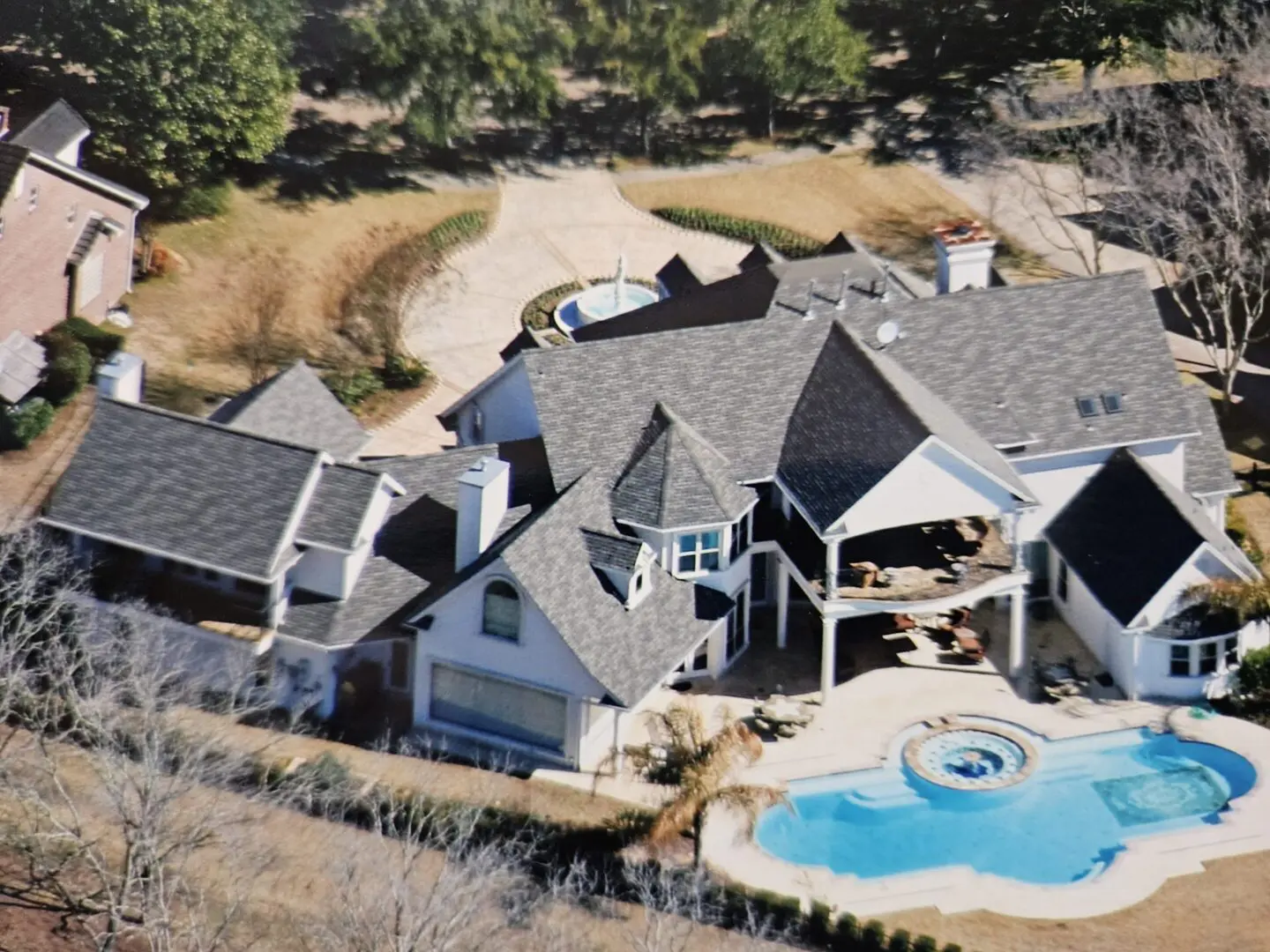 Aerial view of house with swimming pool
