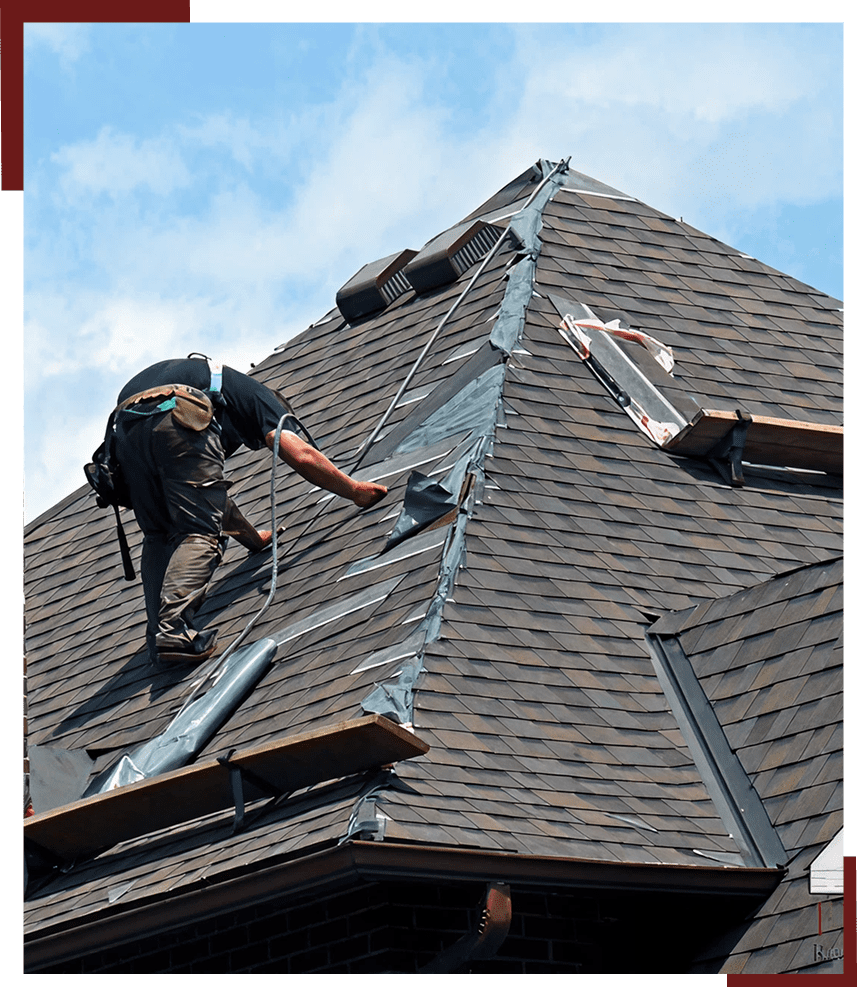 Construction worker repairing roof